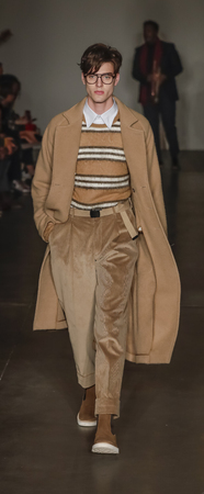 New York, NY, USA - February 5, 2018: A model walks runway at the Todd Snyder Fall/Winter 2018 Runway show during New York Fashion Week: Men's at Pier 59 Studios, Manhattanのeditorial素材