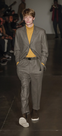 New York, NY, USA - February 5, 2018: A model walks runway at the Todd Snyder Fall/Winter 2018 Runway show during New York Fashion Week: Men's at Pier 59 Studios, Manhattanのeditorial素材