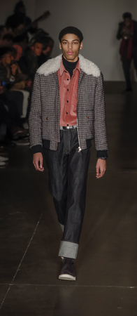 New York, NY, USA - February 5, 2018: A model walks runway at the Todd Snyder Fall/Winter 2018 Runway show during New York Fashion Week: Men's at Pier 59 Studios, Manhattanのeditorial素材