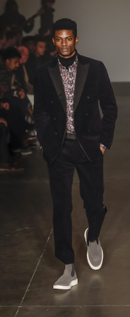 New York, NY, USA - February 5, 2018: A model walks runway at Todd Snyder Fall/Winter 2018 Runway show during New York Fashion Week: Men's at Pier 59 Studios, Manhattanのeditorial素材