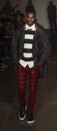 New York, NY, USA - February 5, 2018: A model walks runway at Todd Snyder Fall/Winter 2018 Runway show during New York Fashion Week: Men's at Pier 59 Studios, Manhattanのeditorial素材