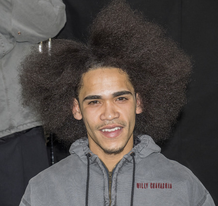 New York, NY, USA - February 5, 2018: A model Prepares backstage for Willy Chavarria Fall/Winter 2018 runway show during NY Fashion Wweek: Men's at Pier 59 Studios, Manhattanのeditorial素材