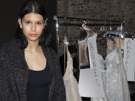 NEW YORK, NY, USA - APRIL 14, 2018: A model prepares backstage for Adam Zohar collection during New York Bridal Week at Industria, Manhattanのeditorial素材