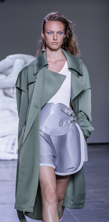 New York, NY, USA - July 10, 2018: A model walks runway for Feng Chen Wang Spring/Summer 2019 runway show during NY Fashion Wweek: Men's at Industria Studios, Manhattanのeditorial素材