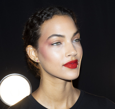 New York, NY, USA - September 11, 2018: A model prepares backstage for the Naeem Khan Spring/Summer 2019 runway show during New York Fashion Week at Spring Studios, Manhattanのeditorial素材