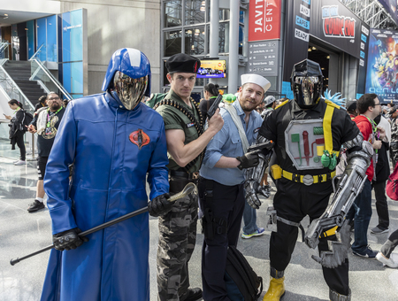 New York, NY, USA - October 5, 2018: Comic Con attendees pose in the costumes during Comic Con 2018 at The Jacob K. Javits Convention Center in New York City.のeditorial素材