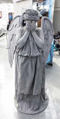 New York, NY, USA - October 5, 2018: Comic Con attendee pose in the costumes during Comic Con 2018 at The Jacob K. Javits Convention Center in New York City.のeditorial素材