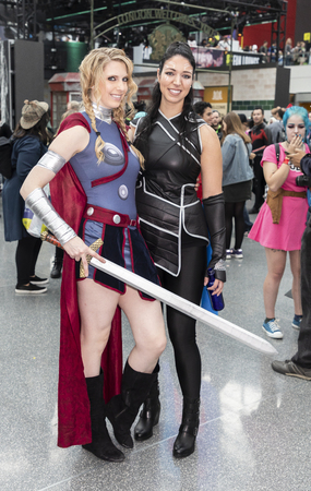 New York, NY, USA - October 5, 2018: Comic Con attendees pose in the costumes during Comic Con 2018 at The Jacob K. Javits Convention Center in New York City.のeditorial素材