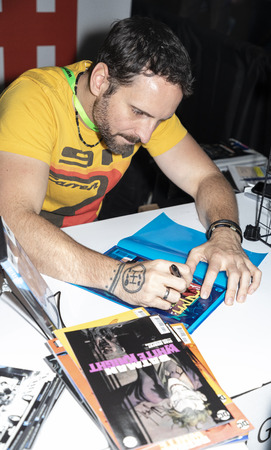 New York, NY, USA - October 4, 2018: Comic book creator Sean Gordon Murfy signing books during Comic Con 2018 at The Jacob K. Javits Convention Center in New York City.のeditorial素材