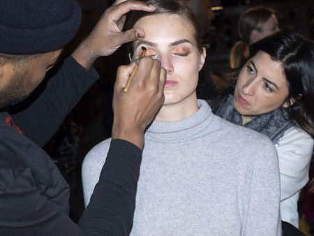 New York, NY, USA - February 11, 2019: A model prepares backstage for Dennis Basso Fall/Winter 2019 Collection during New York Fashion Week at Cipriani 42nd Street, Manhattanのeditorial素材