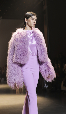 New York, NY, USA - February 8, 2019: A model walks runway for Cushnie Fall/Winter 2019 collection during New York Fashion at Spring Studios, Manhattanのeditorial素材