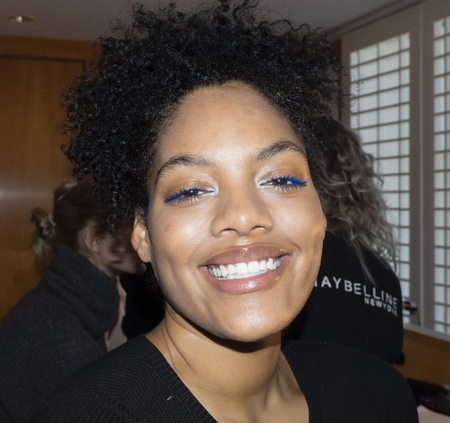 New York, NY, USA - February 9, 2019: A model prepares backstage for the Custo Barcelona Fall/Winter 2019 collection during New York Fashion Week at Pier 59 Studios at Chelsea Piers, Manhattanのeditorial素材