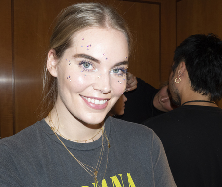 New York, NY, USA - February 9, 2019: A model prepares backstage for the Custo Barcelona Fall/Winter 2019 collection during New York Fashion Week at Pier 59 Studios at Chelsea Piers, Manhattanのeditorial素材
