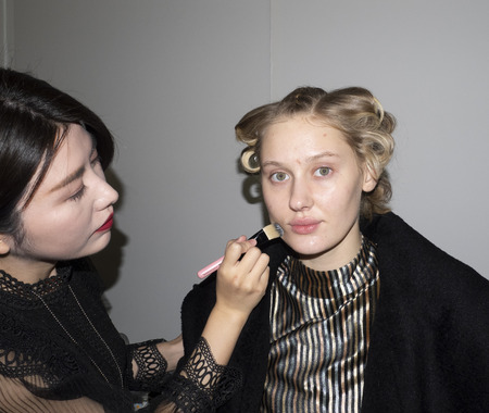New York, NY, USA - February 9, 2019: A model prepares backstage for the Custo Barcelona Fall/Winter 2019 collection during New York Fashion Week at Pier 59 Studios at Chelsea Piers, Manhattanのeditorial素材