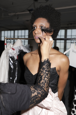New York, NY, USA - April 12, 2019: A model prepares backstage for Francesca Miranda Spring 2020 Presentation during New York Bridal Week at Canoe Studio, Manhattanのeditorial素材