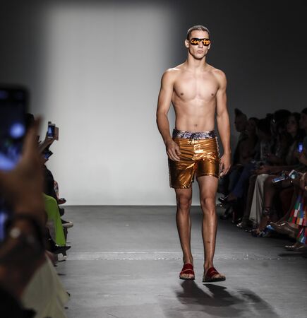 New York, NY, USA - September 9, 2019: A model walks runway for Custo Barcelona Spring/Summer 2020 collection during New York Fashion Week at Pier 59 Studios at Chelsea Piers, Manhattanのeditorial素材