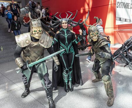 New York, NY, USA - October 4, 2019: Comic Con attendees pose in the costumes during Comic Con 2019 at The Jacob K. Javits Convention Center in New York City.のeditorial素材