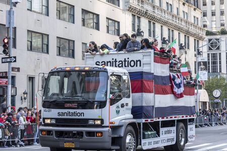New York, NY, USA - October 14, 2019: Sanitation trucks moves along Fifth Avenue during 75th Annual...