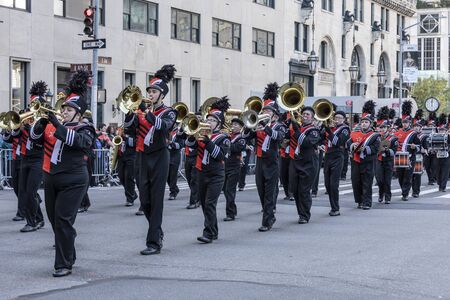 New York, NY, USA - October 14, 2019: Marching bands moves along Fifth Avenue during 75th Annual...