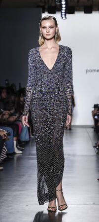 New York, NY, USA - February 7, 2020: A model walks runway for Pamella Roland Fall/Winter 2020 collection during New York Fashion Week at Pier 59 Studuos, Manhattanのeditorial素材
