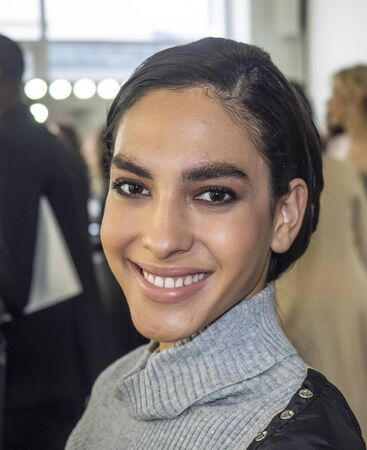 New York, NY, USA - February 7, 2020: A model prepares backstage for Pamella Roland Fall/Winter 2020 collection during New York Fashion Week at Pier 59 Studuos, Manhattanのeditorial素材