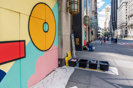 New York, NY, USA - June 24, 2020: Theresa Rivera design artists paint mural ‘Love NYC’ on...