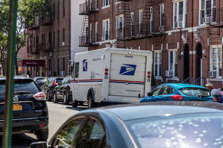 Brooklyn, NY, USA - August 18, 2020: Postal truck seen on the steets of Brooklyn amid postal crisis, COVID-19 and upcoming elections.のeditorial素材