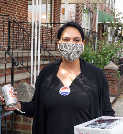 Brooklyn, NY, USA - October 27, 2020: Voters exit poll site after they cast their votes for early general voting at St. Dominic's Catholic Church, Brooklyn amid coronavirus pandemic.のeditorial素材