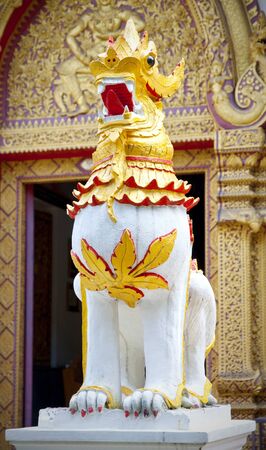 Singh statue in a temple in northern Thailand.の写真素材