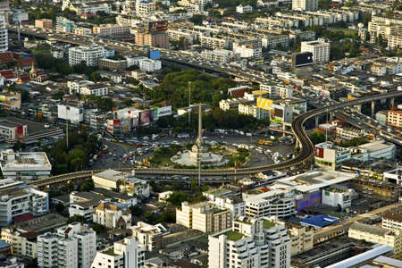Modern skyscraper city streets in the evening,Bangkok,Thailandのeditorial素材