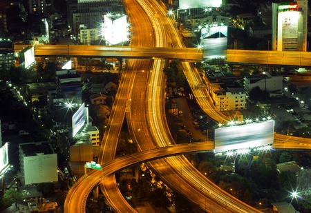 Lights on at night. In the city the car is running.の写真素材