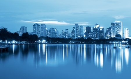 City at night, panoramic scene of downtown reflected in water,thailandの写真素材