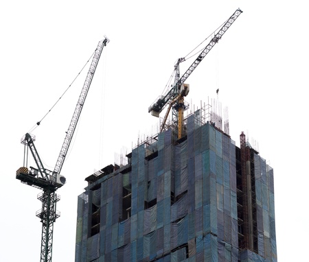 crane near building on Cloudy sky background