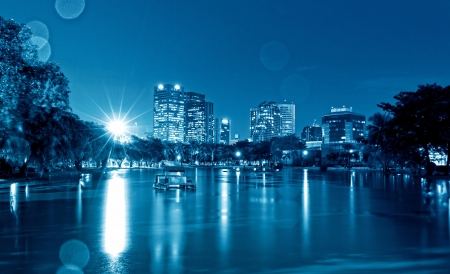 City at night, panoramic scene of downtown reflected in water,thailandの写真素材