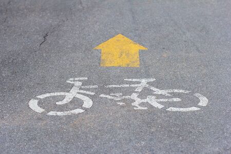 Bicycle road sign painted on the pavement