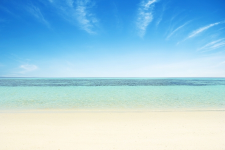 Beaches, crystal clear water, blue sky as background.