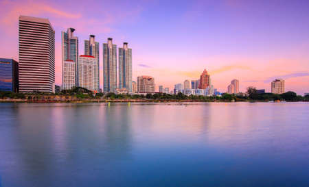 Office building downtown in the evening in Bangkok, Thailand.の写真素材