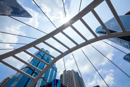 Sathorn Bridge in the daytime sky with clouds downtown Bangkok, Thailand.の写真素材