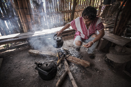Chiang Mai,Oct 17: Indigenous men were made to drink the coffee.At Ban Mae Klang Luang, Chiang Mai, Thailand. on Oct 17, 2015.のeditorial素材