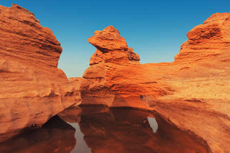 Rocks hit the sun and riverの写真素材