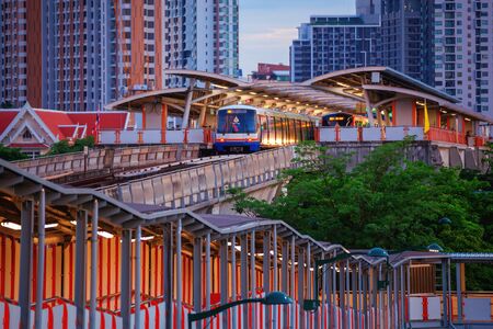 Bangkok - Thailand, 16 July 2019: The road in the evening at Chatuchak Park. Mochit railway station and floating bridge to connect with trains and condosのeditorial素材