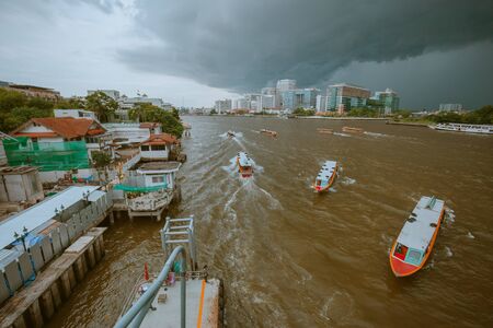 Bangkok - Thailand, 16 Aug 2019 : Boat trip at the Chao Phraya River in Bangkok during the rainy seasonのeditorial素材