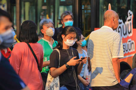 Bangkok - Thailand, 29 Feb 2020: People wearing medical masks Prevents dust and germs. In the evening there was sunshineのeditorial素材