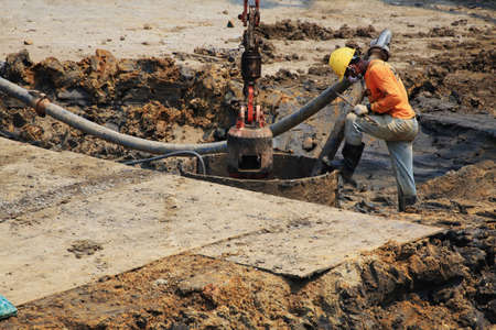 Bangkok - Thailand, 3 March 2020: Construction worker And working in the construction area of ââtall buildingsのeditorial素材