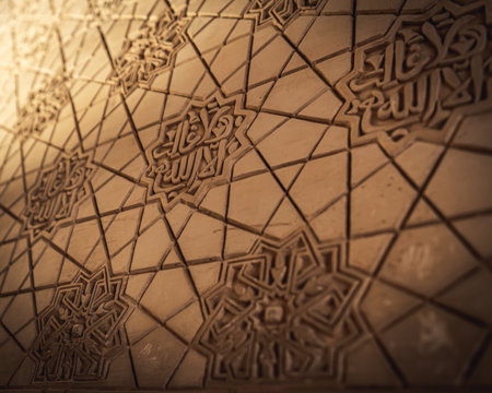 Alhambra's walls mesmerize with intricate details, a testament to the artistry and grandeur of its historical legacy.の写真素材