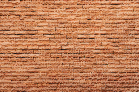 Brick wall background: Rustic charm and textured beauty combine in a versatile backdrop that adds timeless appeal to any composition.の写真素材