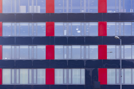 Modern office building, office windows backgroundの写真素材