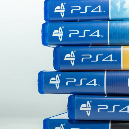 Melbourne, Australia - January 11th 2019: PS4 Logo Showing On Game Cases Stacked Horizontally