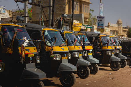 Indian tuk tuk rickshaw parked and lined up in Rajasthanのeditorial素材