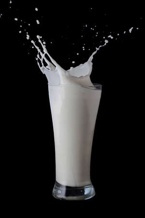 Milk splash in glass stock photoの写真素材